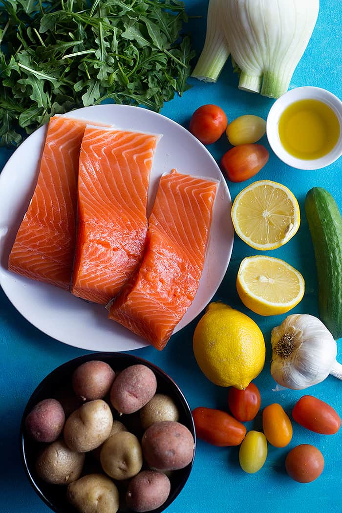 To make Baked salmon fillet with lemon you need salmon fennel potatoes lemon olive oil and garlic. 