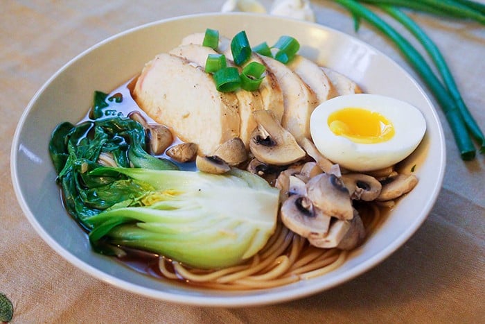 Chicken ramen is perfect for weeknight dinners. Top with eggs, chicken and bok choy. 