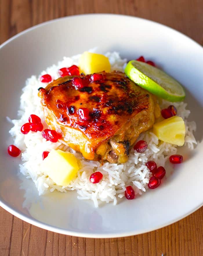 Sweet and savory chicken thighs with pomegranate arils. 