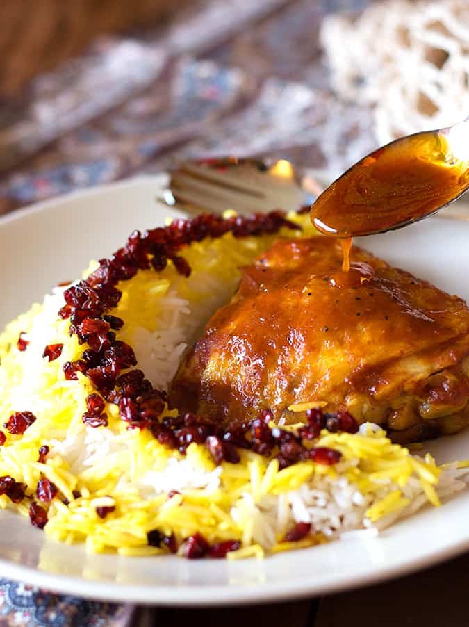 Zereshk polo morgh is a dish full of amazing flavors including saffron!