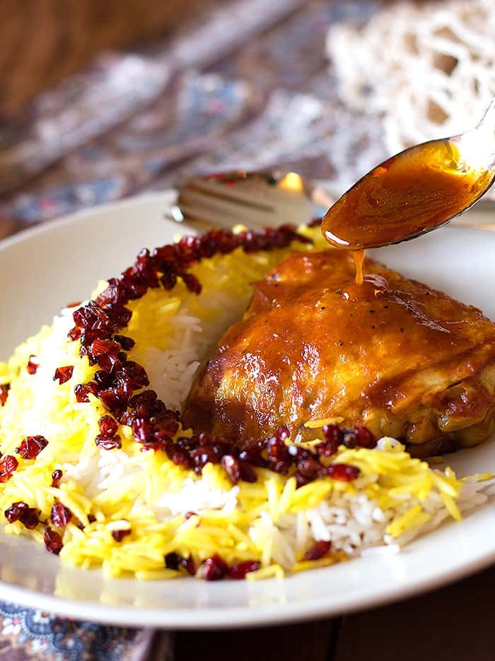 Zereshk polo morgh is a dish full of amazing flavors including saffron!