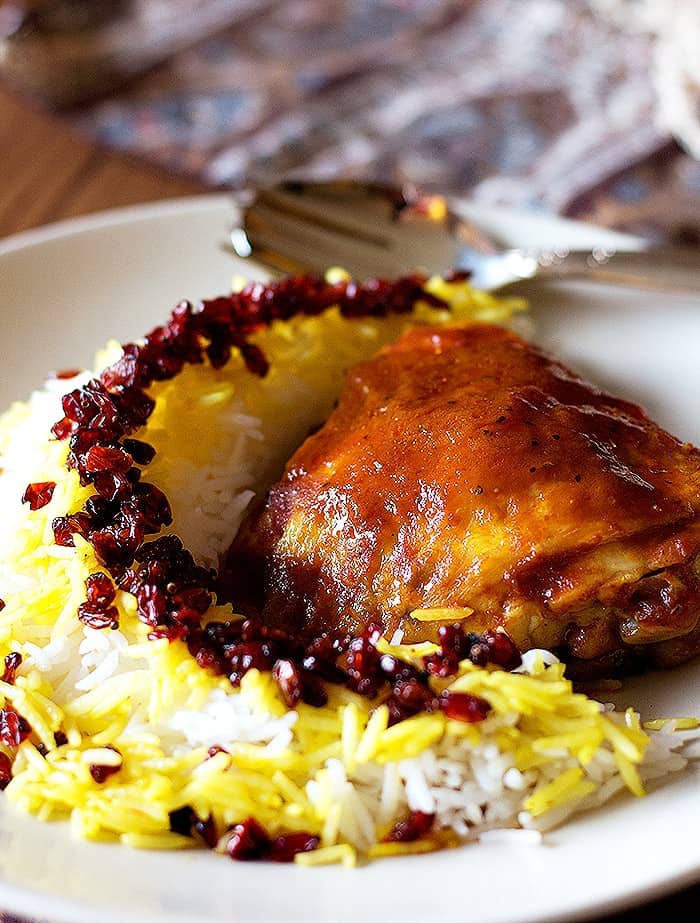 Zereshk polo morgh is a dish full of amazing flavors including saffron!