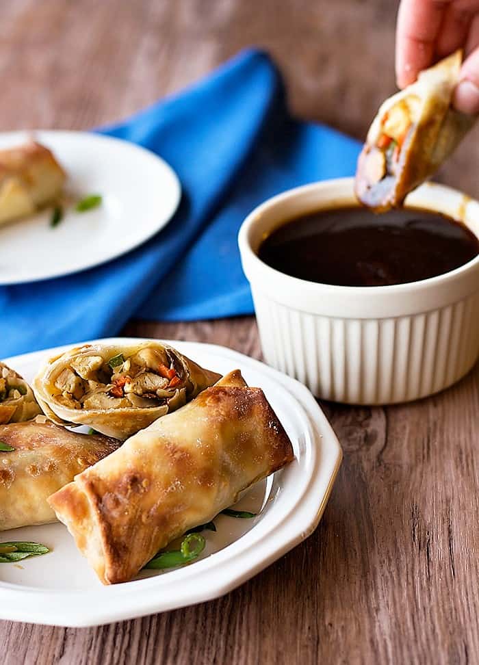 Delicious Chicken Egg Rolls that are baked instead of fried. Served with a sauce that keeps your diet balanced! Deliciousness without the guilt!