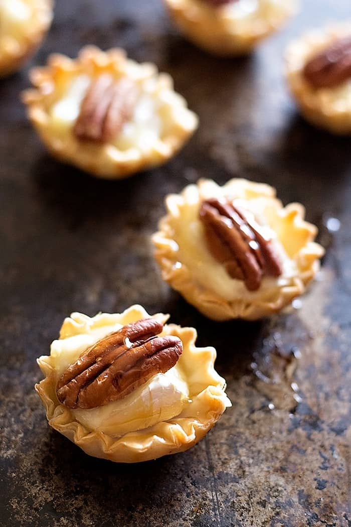 Rock your table with these easy Pecan and Brie Phyllo cups and drizzle some honey on top to boost the flavor! All in 15 minutes and very little effort!