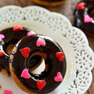 These chocolate glazed baked donuts will be your new favorite donuts! No frying required so you can just make them in big batches and enjoy having delicious donuts!