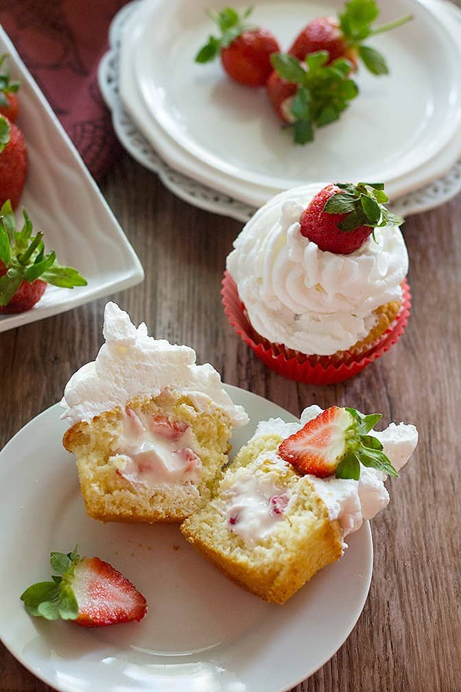 Strawberry Cheesecake Cupcakes are a match made in heaven! Enjoy them the most by adding some strawberries! They are fluffy, fresh and irresistibly delicious! 