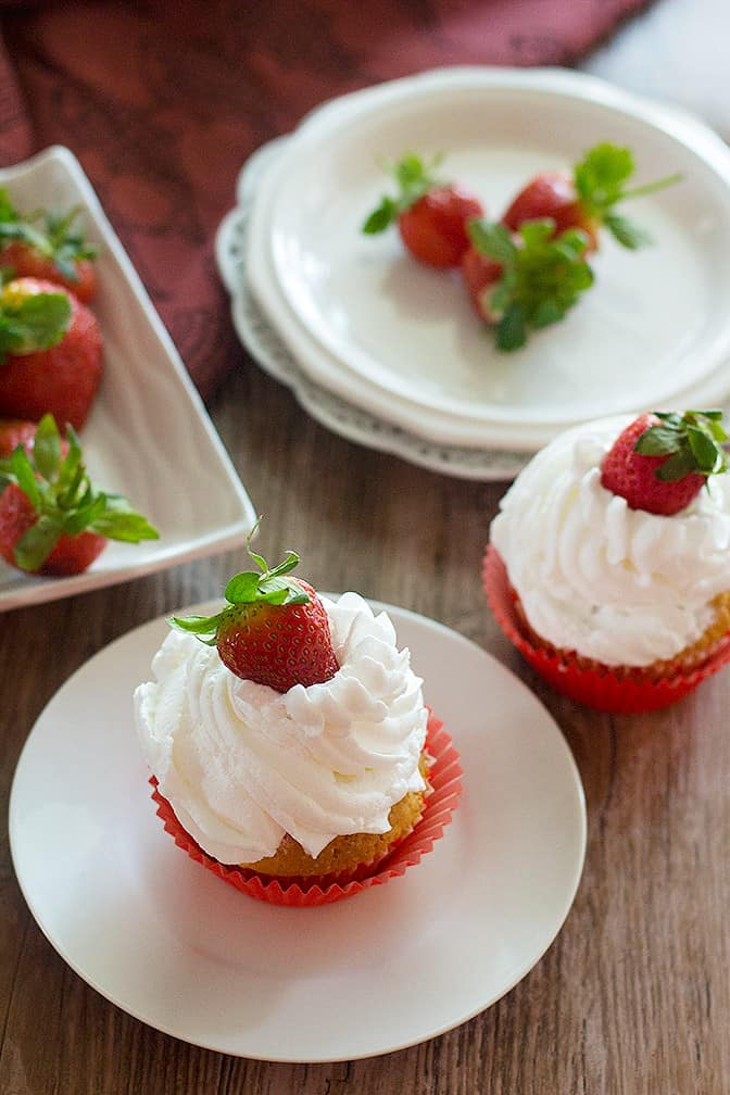 Strawberry Cheesecake Cupcakes are a match made in heaven! Enjoy them the most by adding some strawberries! They are fluffy, fresh and irresistibly delicious! 