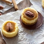 Enjoy a bite of happiness with these cute Caramel Pecan Mini Cheesecakes made in a muffin pan. They're velvety, creamy and have a perfect balance of sweetness!