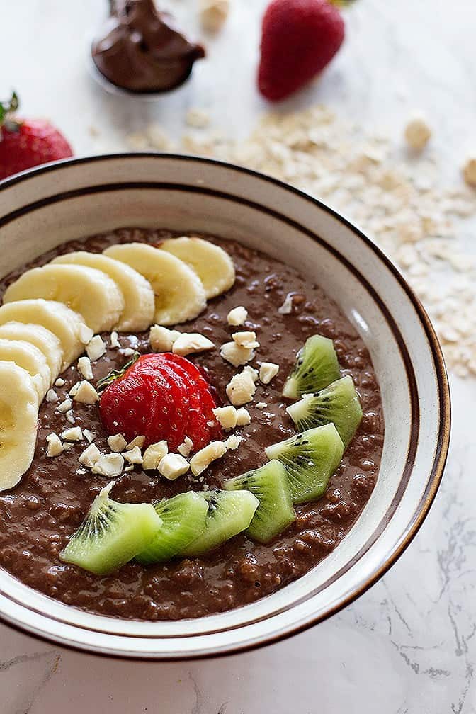 This Nutella Cocoa Oatmeal Bowl is perfect for breakfast, or any time that you crave something sweet and easy! Make it even better by adding some cocoa powder! 