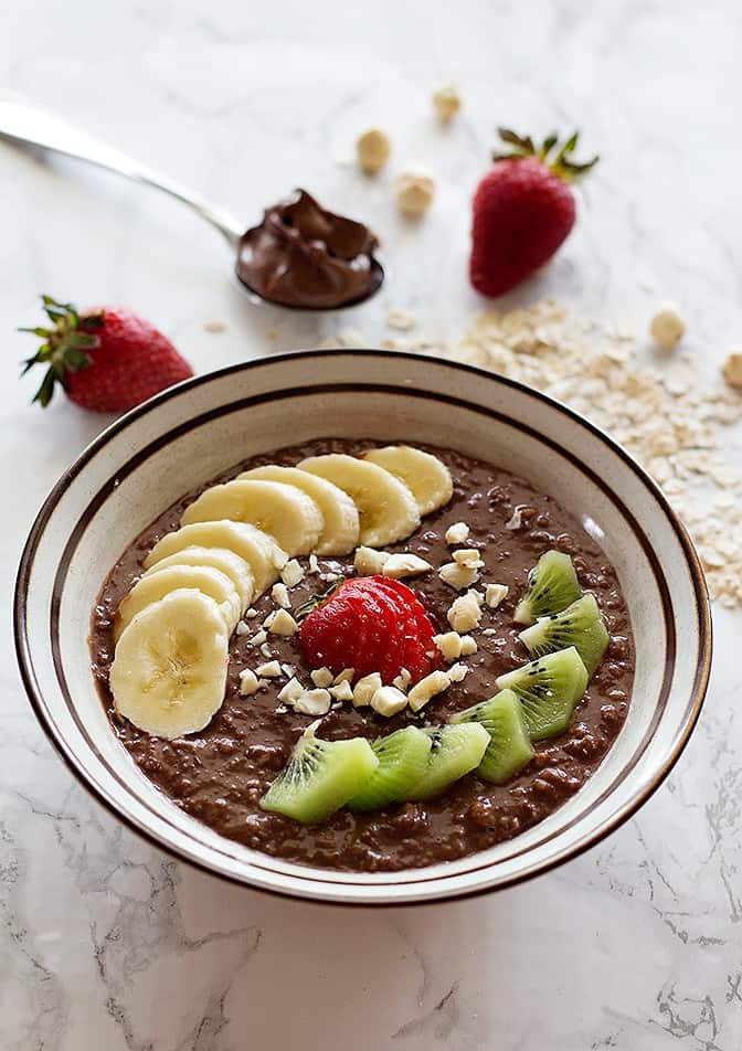 This Nutella Cocoa Oatmeal Bowl is perfect for breakfast, or any time that you crave something sweet and easy! Make it even better by adding some cocoa powder! 