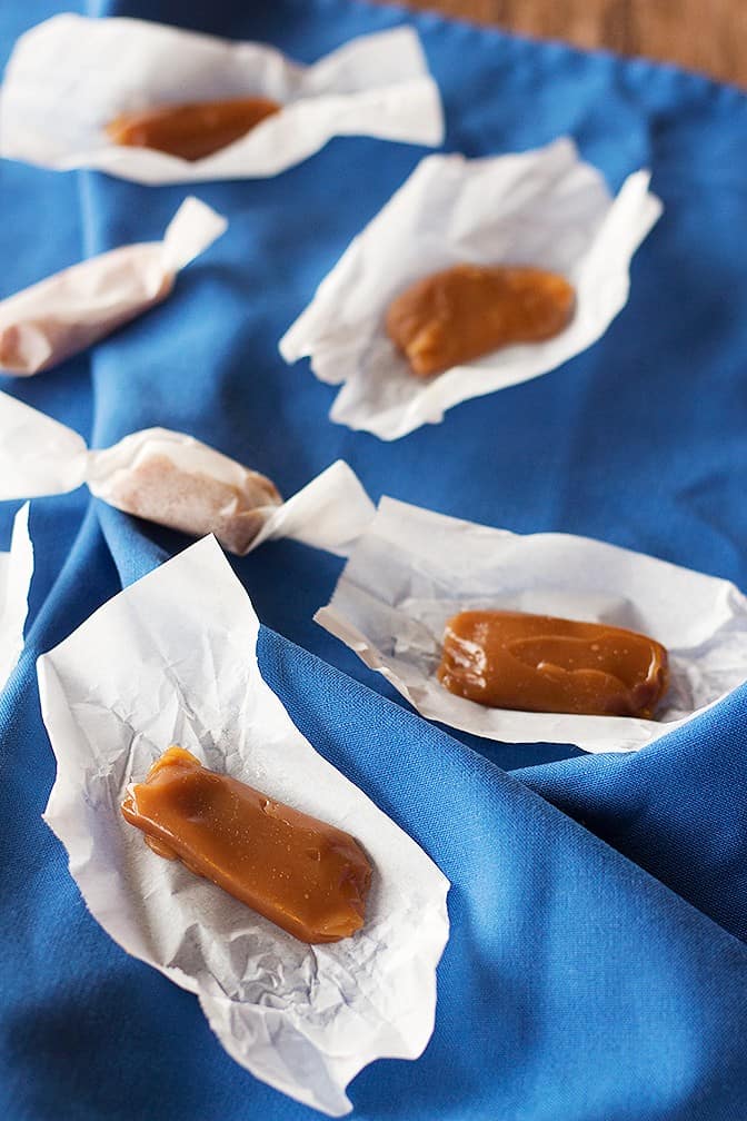 Use this Chewy Caramel Recipe with my tips and tricks this holiday season. These tiny treats are easy to make and they're great gifts for everyone.