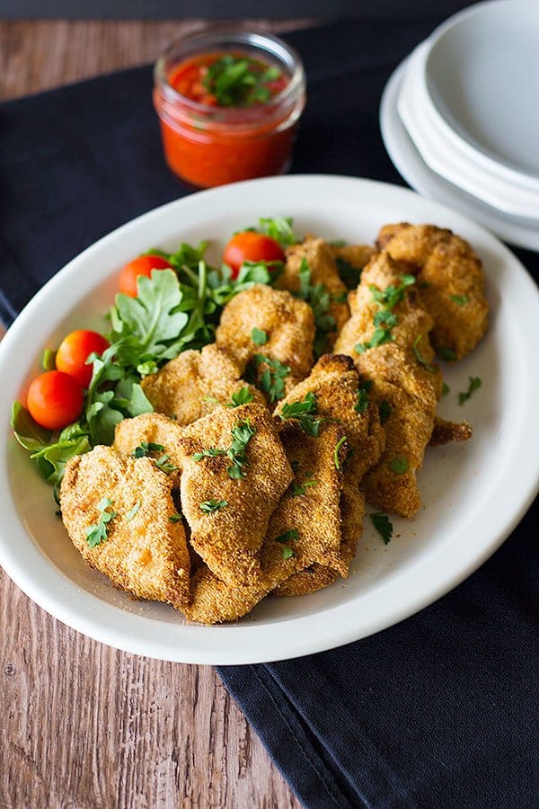 easy and simple garlic parmesan chicken tenders are perfect for dinner. 