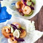 Make these Sriracha Lime Shrimp Lettuce Wraps to enjoy a light meal with some heat and cool it down with a refreshing avocado cabbage topping!