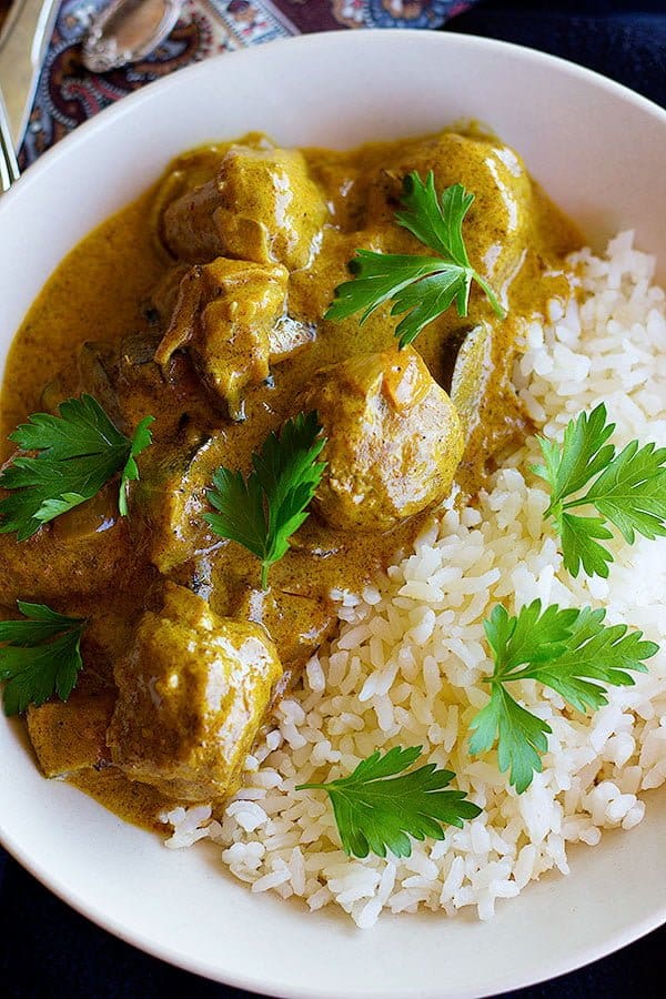 Creamy meatball curry with white rice. 