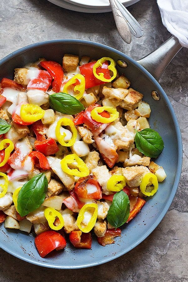 This one pan 5-ingredient chicken skillet is perfect for weeknight dinners as it comes together in 30 minutes. The final addition of pepper rings gives a bold flavor to the dish! 