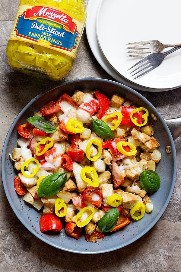 This one pan 5-ingredient chicken skillet is perfect for weeknight dinners as it comes together in 30 minutes. The final addition of pepper rings gives a bold flavor to the dish! 