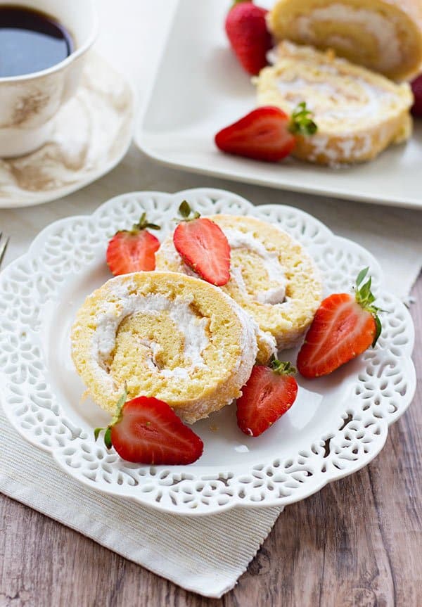 This strawberry cream swiss roll is the ultimate summer treat! It's airy, delicious, and full of whipped cream. Making a swiss roll at home is way easier than what you may think!