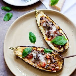 Stuffed Eggplant Parmesan is a great choice for dinner. Meaty eggplants that are filled with ground beef and topped with two types of cheese, who can say no to this?