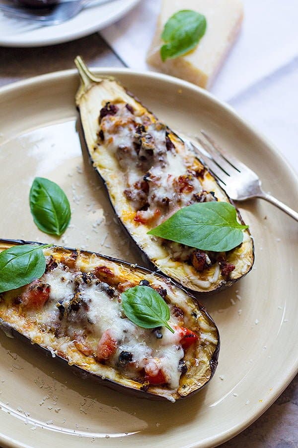 Close-up of stuffed eggplants with basil and parmesan cheese