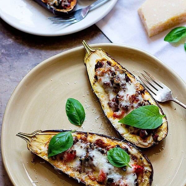Stuffed Eggplant Parmesan is a great choice for dinner. Meaty eggplants that are filled with ground beef and topped with two types of cheese, who can say no to this?