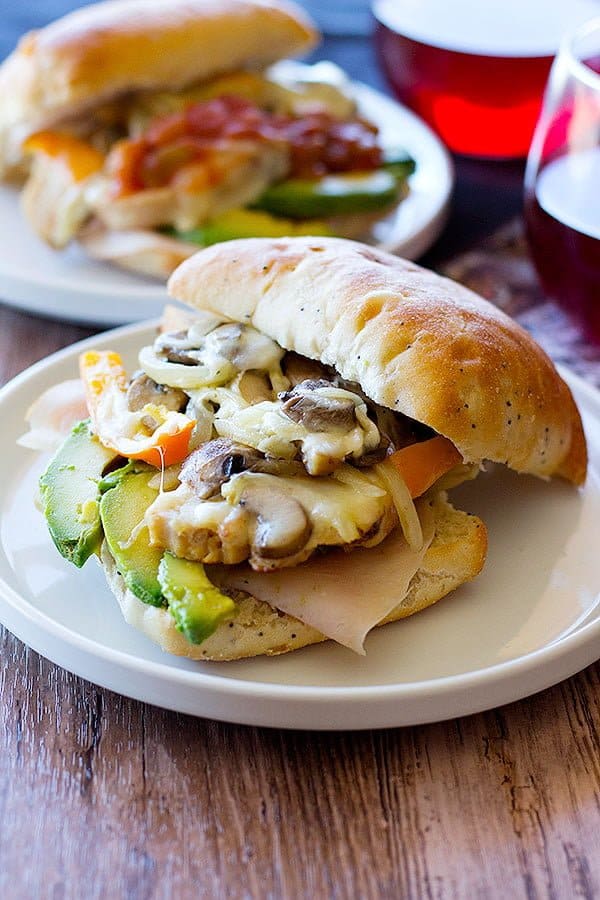 Spice up your after school game with this delicious loaded grilled chicken gourmet sandwich made with two types of meat and different vegetables in no time!