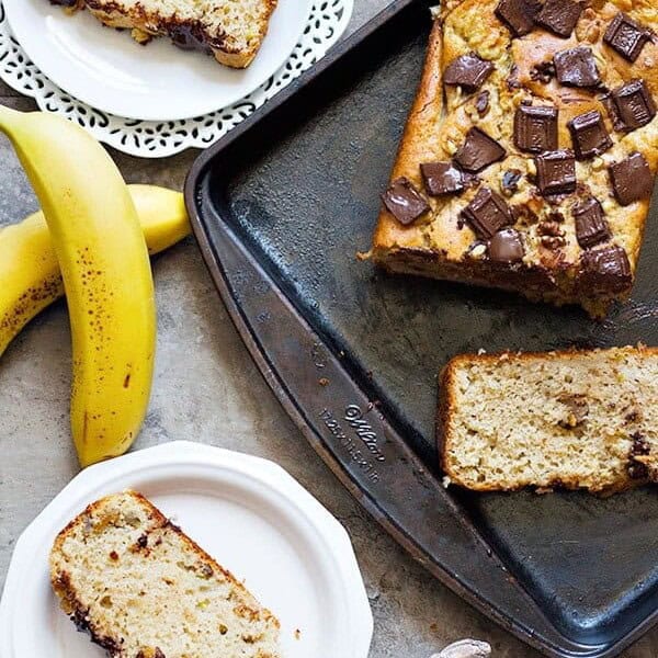 This banana chocolate chunk bread is a perfect way to use up all those ripe bananas. It's moist and fluffy with melted chocolate chunks bursting in each bite!