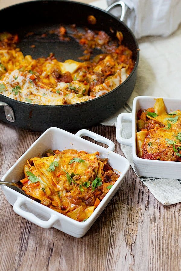 This cheesy lazy one pot lasagna is the perfect answer to "What should I make tonight?". It's made with ingredients that you already have at hand, and there's an easy shortcut!