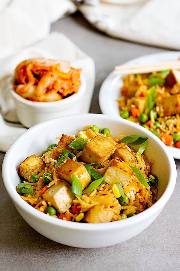 Tofu Kimchi Fried Rice is an easy dish that you can make at home all the time. The baked and seasoned tofu gives this fried rice a wonderful flavor!