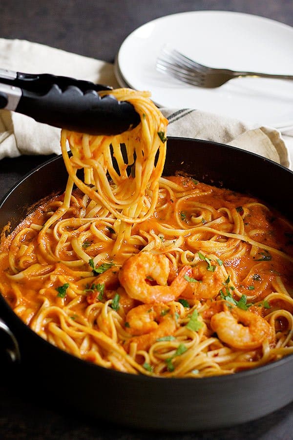 This Easy Spicy Shrimp Marinara Linguine will be on your table in less than 45 minutes and it tastes amazing! With the right amount of spiciness, this pasta will become everyone's favorite! 