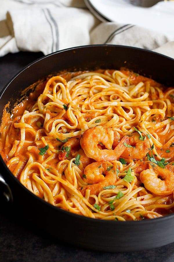 This Easy Spicy Shrimp Linguine will be on your table in less than 45 minutes and it tastes amazing! With the right amount of spiciness, this pasta will become everyone's favorite! 