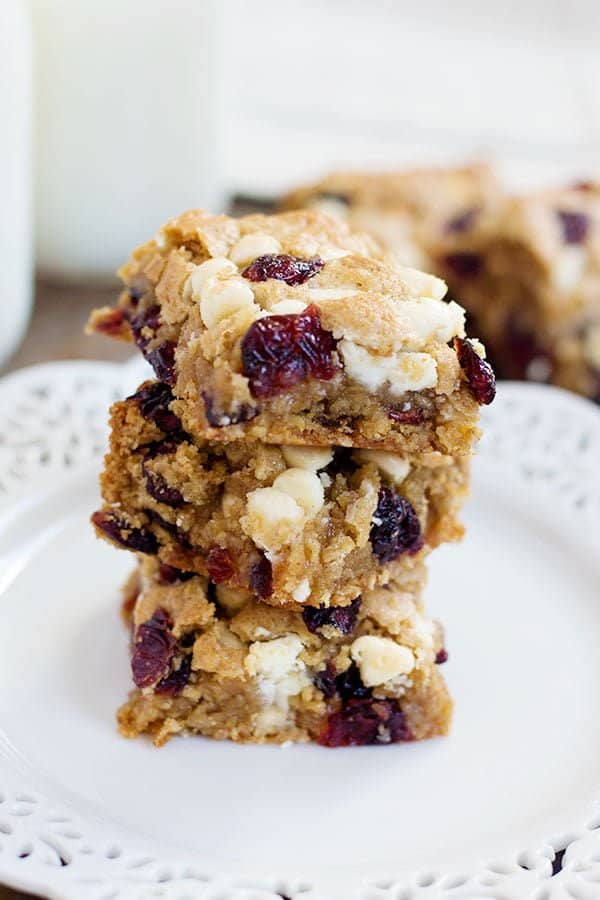 These Cranberry White Chocolate Oatmeal Cookie Bars have all the good flavors in one single bite! Sweet and tart cranberries go very well with festive white chocolate morsels!