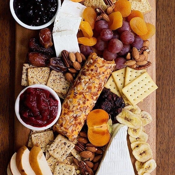 Learn How to Build the Perfect Cheese Board in two different themes that will rock your parties. These cheeseboards are great for holiday parties and gatherings!