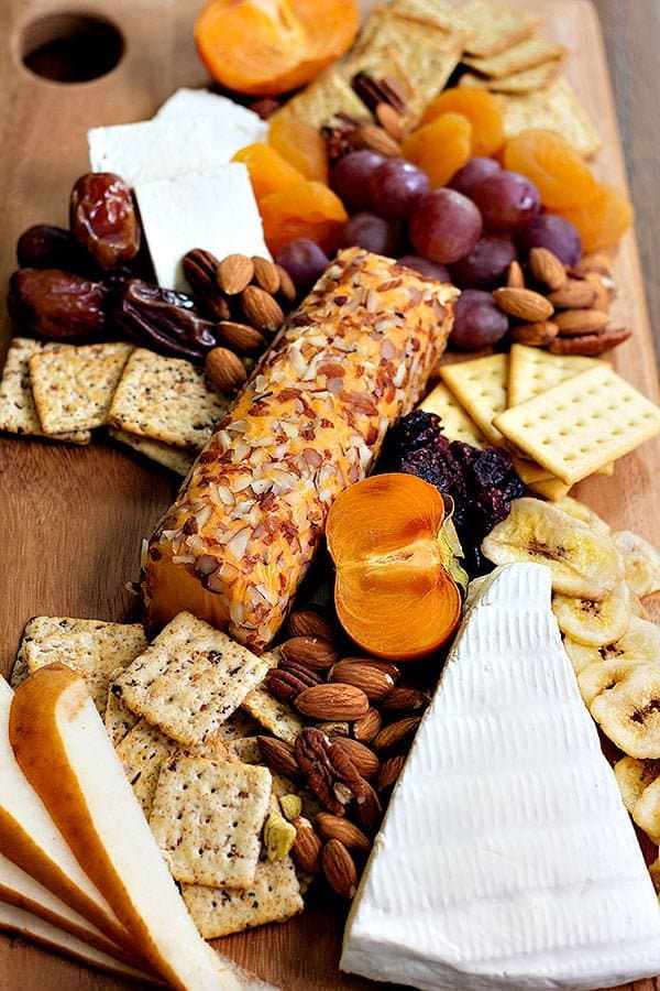 Learn How to Build the Perfect Cheese Board in two different themes that will rock your parties. These cheeseboards are great for holiday parties and gatherings!