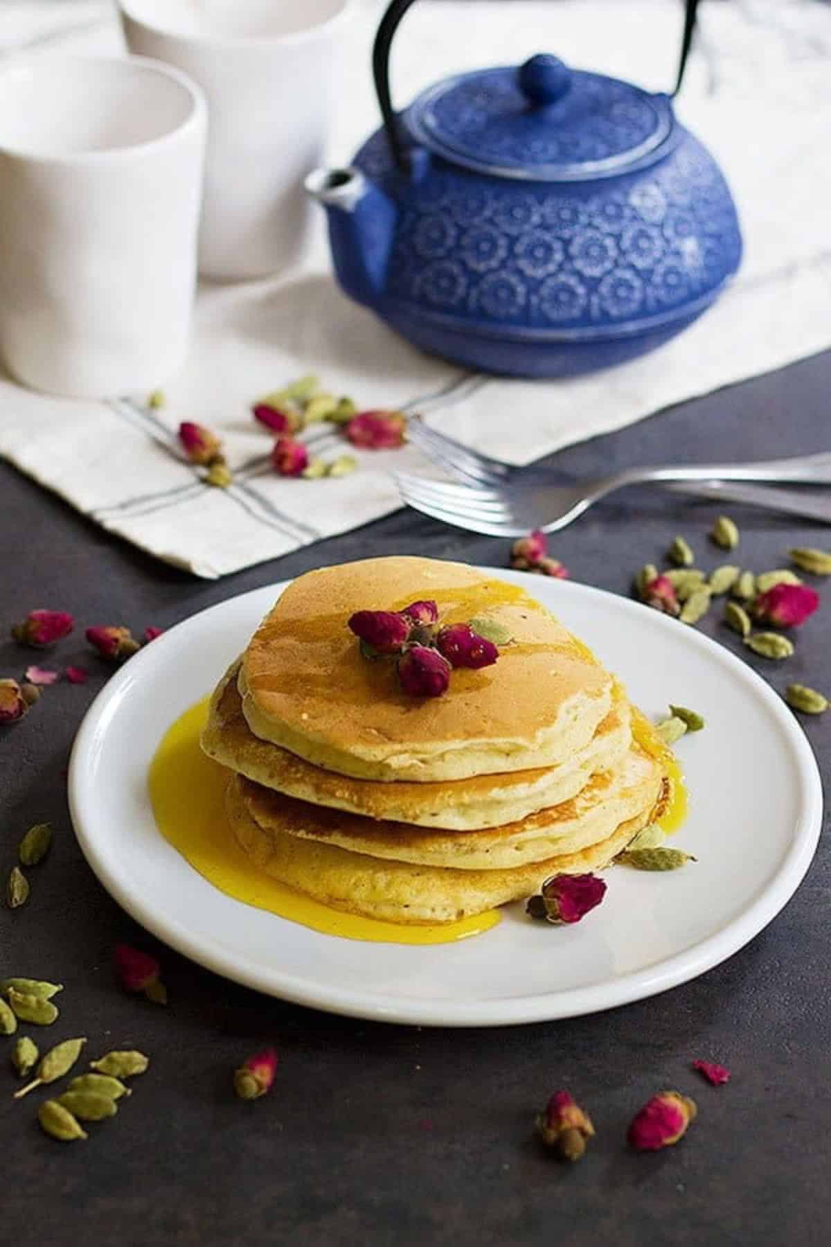 A classic American recipe with a Persian twist, these rosewater cardamom pancakes with saffron syrup are the love between east and west. The fluffy pancakes with rose and cardamom aroma kissed by saffron syrup, a dream come true!