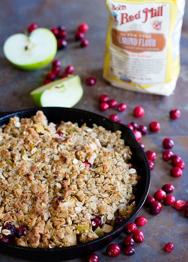 Apple Cranberry Almond Crisp is great for chill evenings. Tart apples and juicy cranberries bring together the perfect texture and flavor. This dish gets better with every bite!