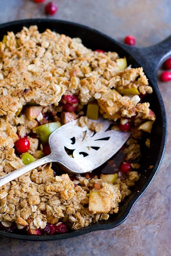 Apple Cranberry Almond Crisp is great for chill evenings. Tart apples and juicy cranberries bring together the perfect texture and flavor. This dish gets better with every bite!