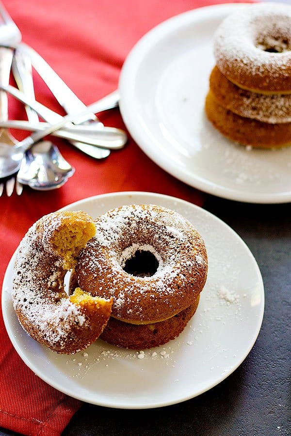 Baked Pumpkin Donuts are so simple and can be made in less than an hour using basic ingredients that are already in your pantry. From UnicornsintheKitchen.com