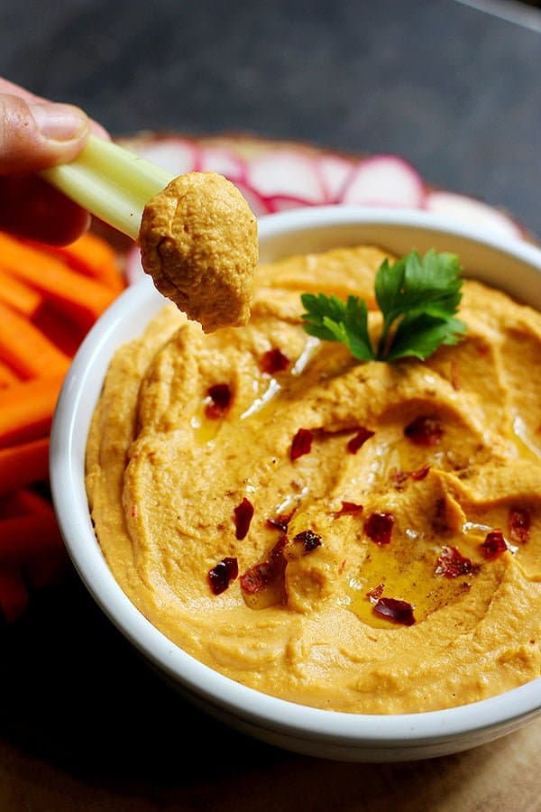 serve hummus dip with celery sticks, carrots and radishes. 