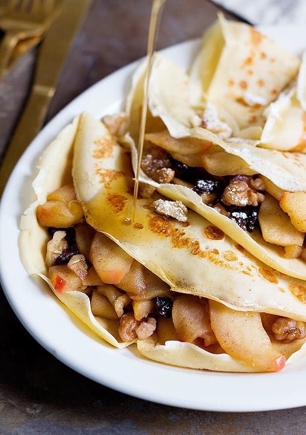 These Apple Pie Crepes are the perfect start to a beautiful day. You will love these light and lacy crepes filled with delicious apples and crispy walnuts!