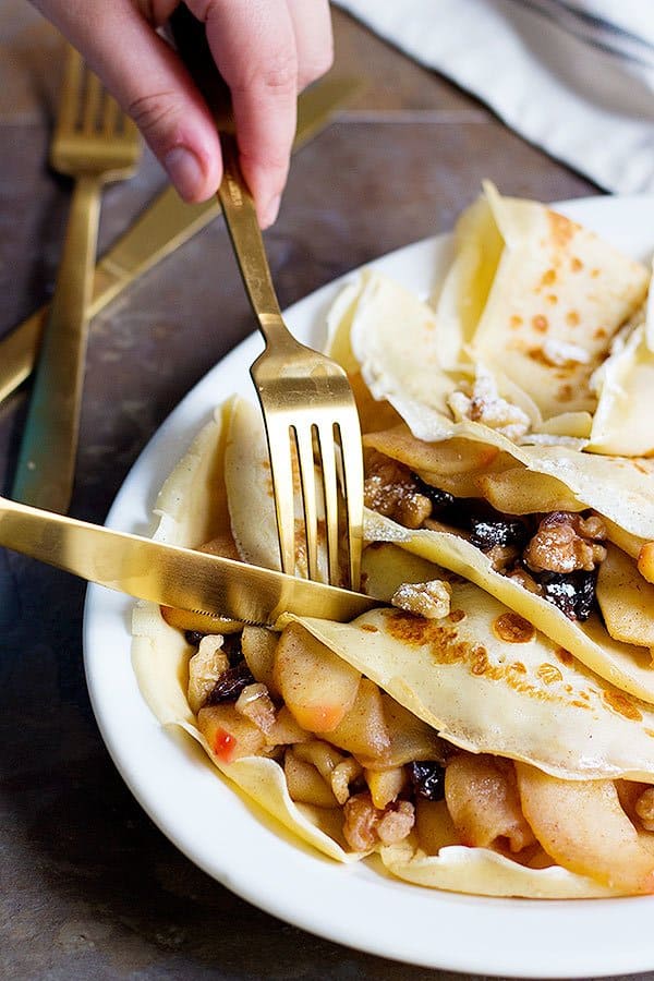 These Apple Pie Crepes are the perfect start to a beautiful day. You will love these light and lacy crepes filled with delicious apples and crispy walnuts!