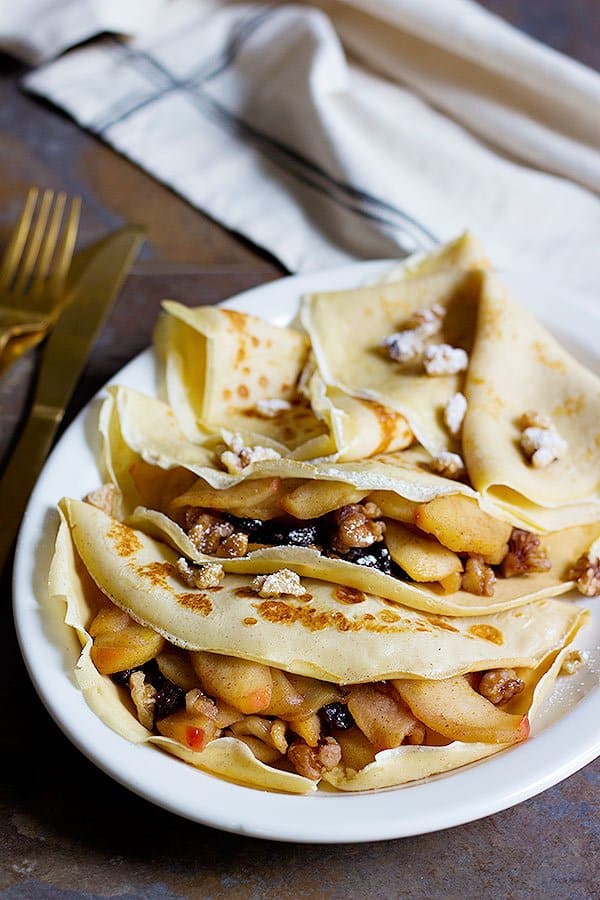 These Apple Pie Crepes are the perfect start to a beautiful day. You will love these light and lacy crepes filled with delicious apples and crispy walnuts!