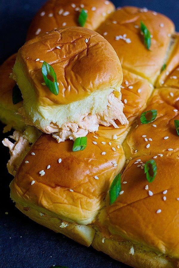 Buffalo chicken sliders are so simple to make and can easily feed a crowd. Creamy gooey sliders packed with flavor and heat from buffalo sauce!