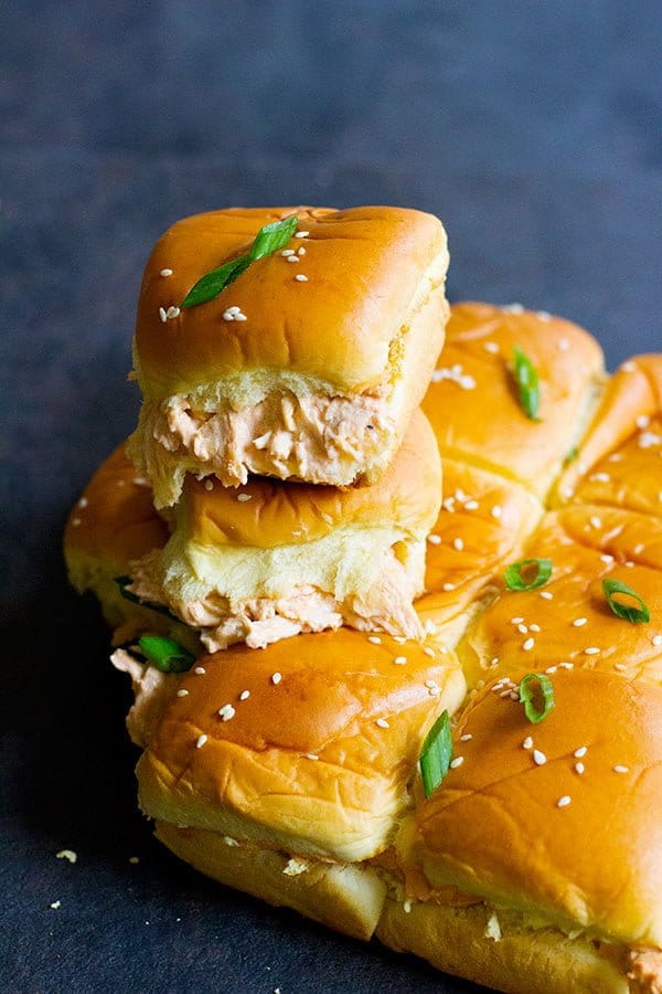 Buffalo chicken sliders are so simple to make and can easily feed a crowd. Creamy gooey sliders packed with flavor and heat from buffalo sauce!