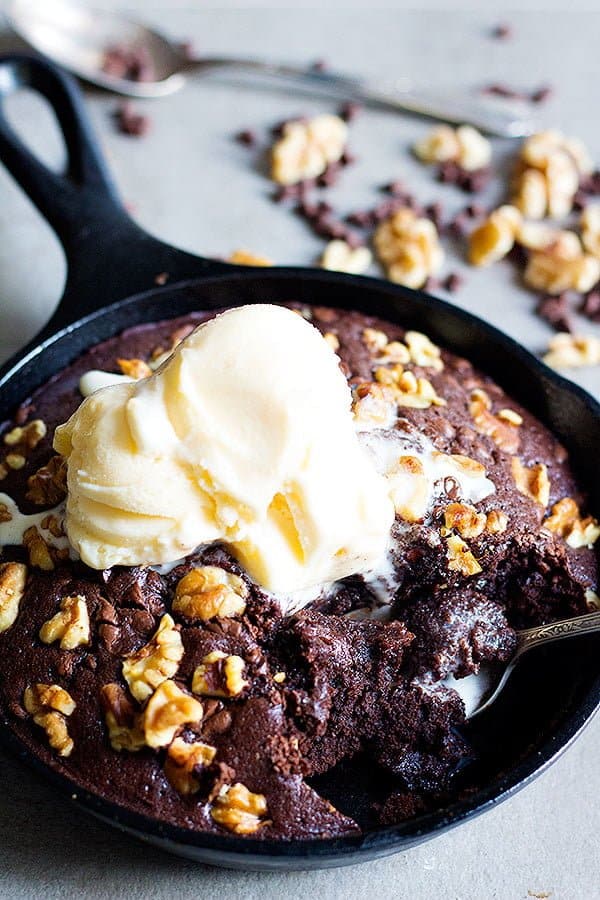 Nothing beats a good ooey gooey Double Chocolate Walnut Skillet Brownie with a large glass of milk. You'll need only a few ingredients to make this delicious skillet brownie!