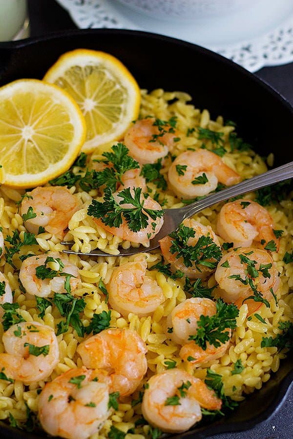 Start spring with this light and delicious Lemon Ginger Shrimp Orzo. It's full of fresh flavors and you can make it with just a few ingredients in only 25 minutes!