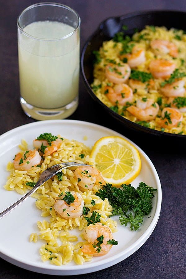 Start spring with this light and delicious Lemon Ginger Shrimp Orzo. It's full of fresh flavors and you can make it with just a few ingredients in only 25 minutes!