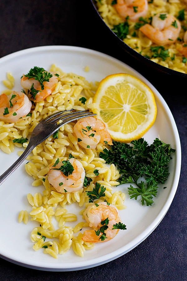 Start spring with this light and delicious Lemon Ginger Shrimp Orzo. It's full of fresh flavors and you can make it with just a few ingredients in only 25 minutes!