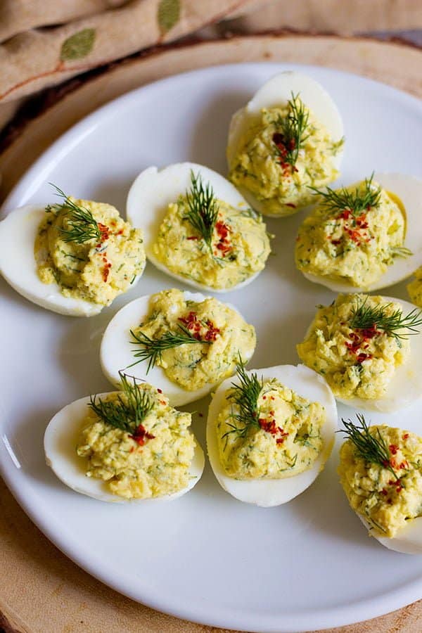Mediterranean Deviled Eggs are the perfect twist on your favorite appetizer. The herbs and spices in this recipe make a refreshing dish that's quick and tasty!