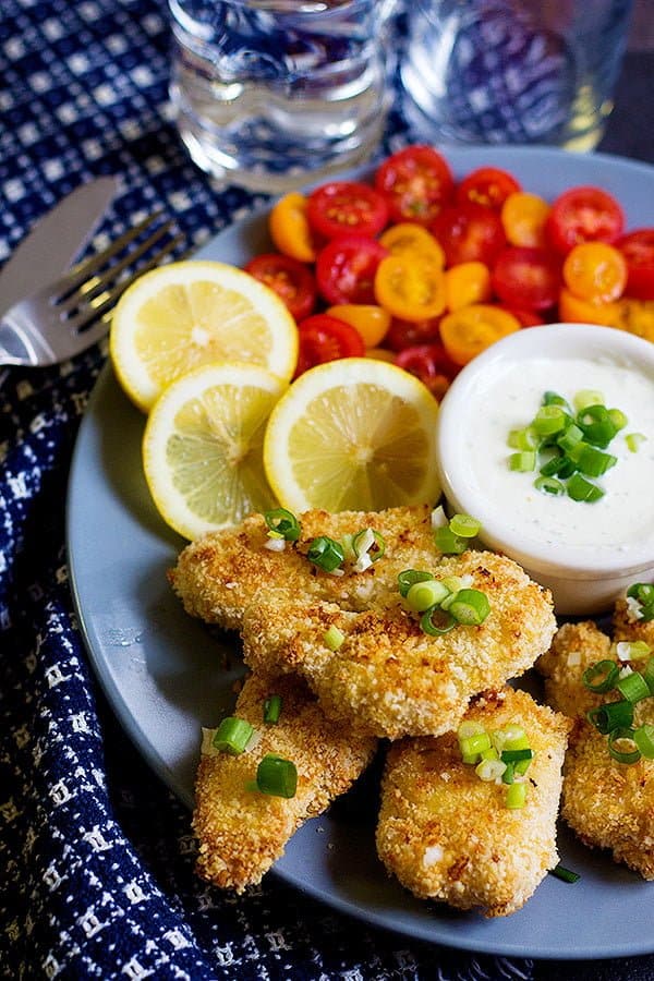 Baked chicken tenders served with lemon and tomatoes with a ranch dipping sauce. 