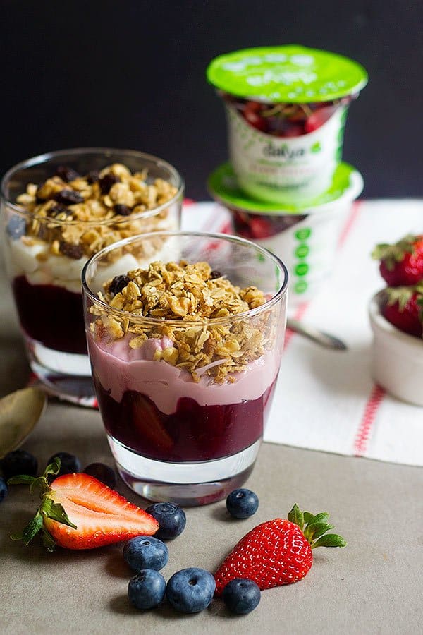 Start your day happily with a delicious Mixed Berry Granola Parfait. Delicious layers of mixed berries, yogurt alternative, and granola = perfection in every spoonful.